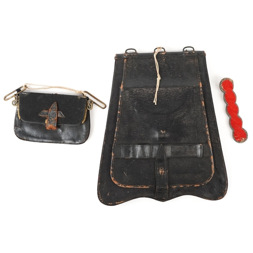 729 - A military interest embroidered Royal Artillery officer's full dress sabretache, a matching dress be... 