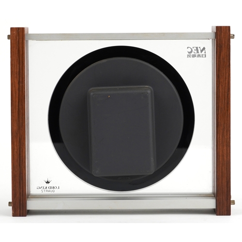 159 - A Lord King quartz world clock within a teak glazed case, made in Japan, 20cm H x 24cm W x 7cm D.