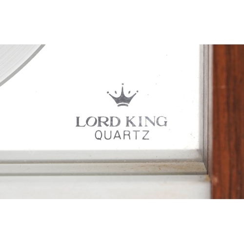 159 - A Lord King quartz world clock within a teak glazed case, made in Japan, 20cm H x 24cm W x 7cm D.