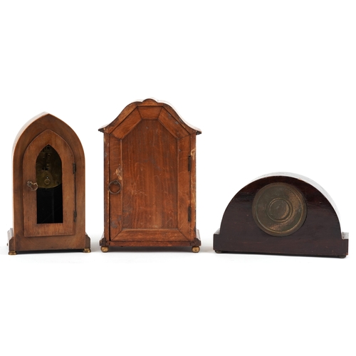 154 - Three Edwardian mahogany mantle clocks, each having a white enamelled dial and black Roman numerals,... 