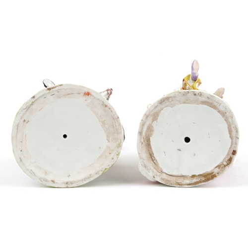 42 - Two early porcelain figures of a shepherd and shepherdess, the largest 28cm high.