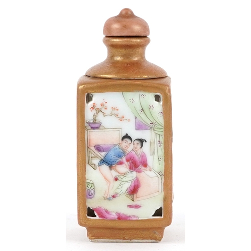 134 - A Chinese porcelain scent bottle hand painted with an erotic scene and inscription, character marks ... 