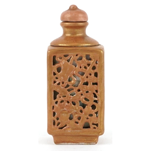 134 - A Chinese porcelain scent bottle hand painted with an erotic scene and inscription, character marks ... 