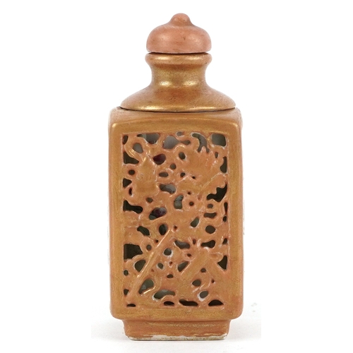 134 - A Chinese porcelain scent bottle hand painted with an erotic scene and inscription, character marks ... 