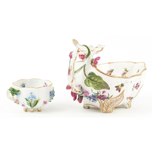 35 - A 19th century Meissen German porcelain floral encrusted tea cup together with a strawberry leaf sau... 