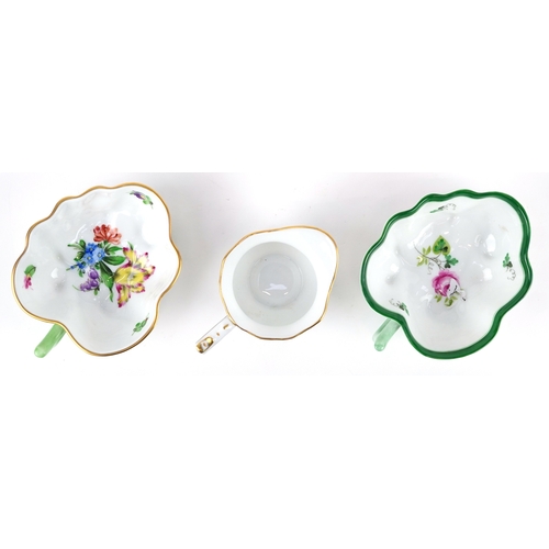 41 - Herend, Hungarian porcelain leaf shaped dishes and milk jug, each with hand painted floral decoratio... 