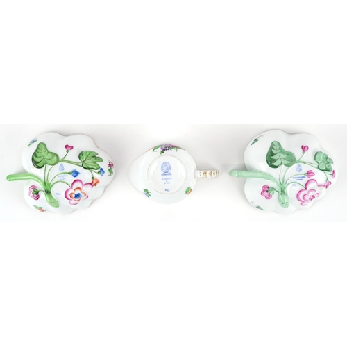 41 - Herend, Hungarian porcelain leaf shaped dishes and milk jug, each with hand painted floral decoratio... 
