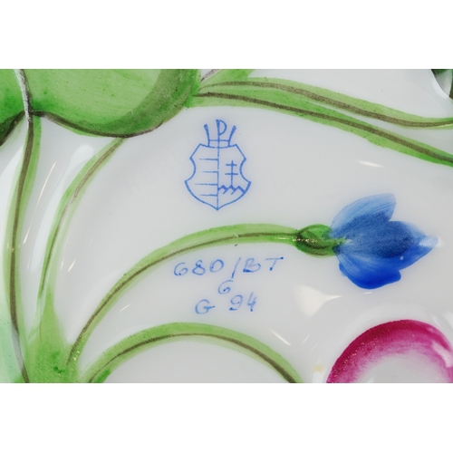41 - Herend, Hungarian porcelain leaf shaped dishes and milk jug, each with hand painted floral decoratio... 