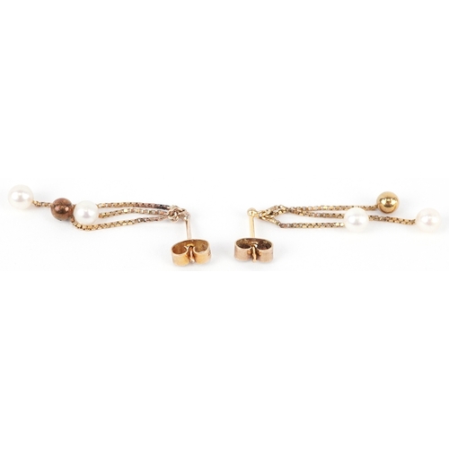 A pair of unmarked gold cultured pearl drop earrings, 3.5cm high, total ...