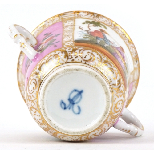 36 - A 19th century porcelain twin handled chocolate cup and cover hand painted with panels depicting a c... 