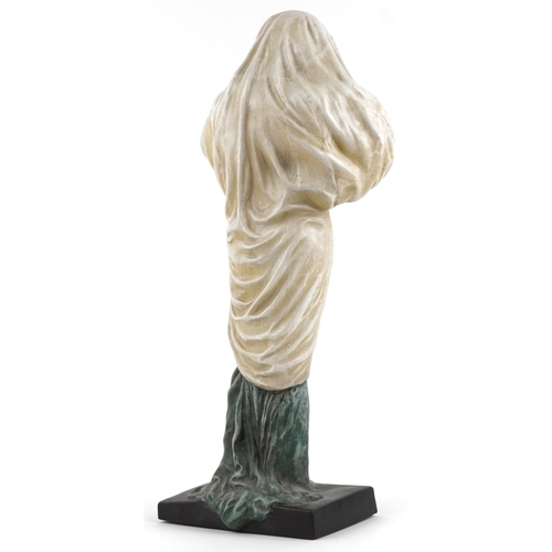 311 - A large pottery figure of a semi nude maiden, 64cm high.