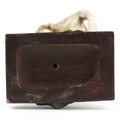 311 - A large pottery figure of a semi nude maiden, 64cm high.