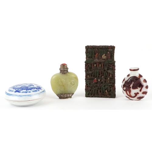 137 - A Chinese green stone snuff bottle with silver plated mounts together with a carved boxwood card cas... 