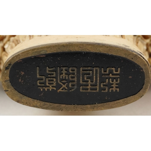 136 - Six Chinese carved scent bottles, the largest 9cm high.