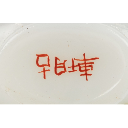 135 - Five Chinese glass snuff bottles and stoppers, each with hand painted decoration including dragons a... 