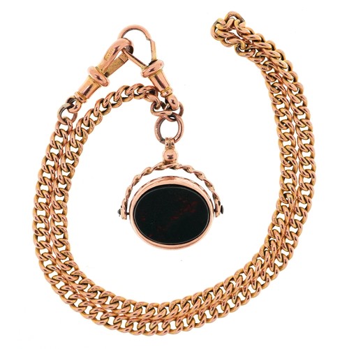 A 9ct gold watch chain with a 9ct gold bloodstone and carnelian spinner fob, Birmingham 1911, 2.8cm high and 36cm in length, total 12.6g.