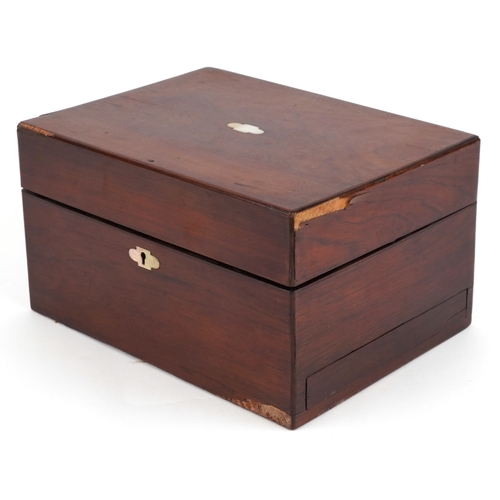 47 - An early 19th century rosewood workbox with fitted interior, glass jars and secret drawer, the hinge... 
