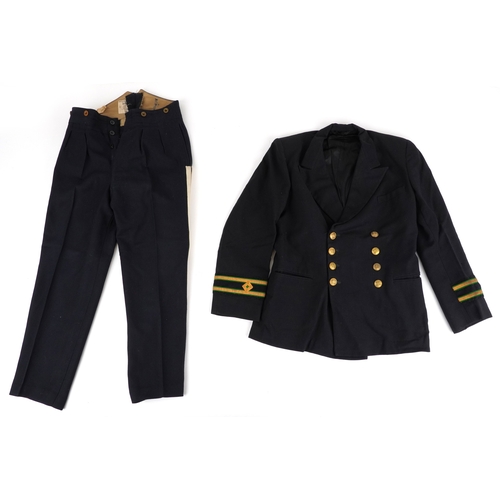 743 - A collection of military interest uniforms, paperwork, cap badges, hats and other militaria includin... 