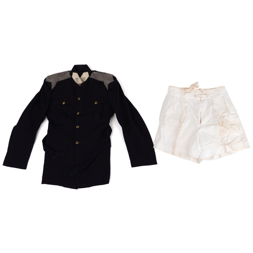 743 - A collection of military interest uniforms, paperwork, cap badges, hats and other militaria includin... 