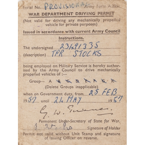 743 - A collection of military interest uniforms, paperwork, cap badges, hats and other militaria includin... 