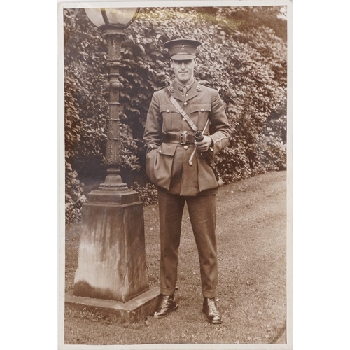 743 - A collection of military interest uniforms, paperwork, cap badges, hats and other militaria includin... 