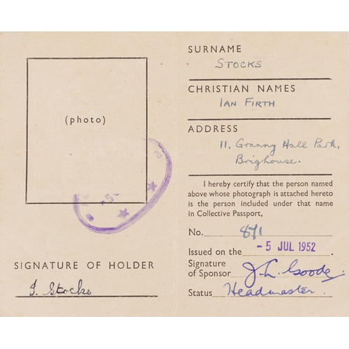 743 - A collection of military interest uniforms, paperwork, cap badges, hats and other militaria includin... 