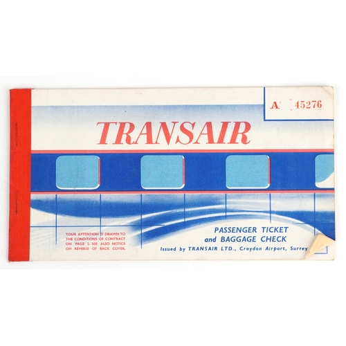 743 - A collection of military interest uniforms, paperwork, cap badges, hats and other militaria includin... 