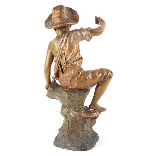 31 - A Goldscheider style pottery figure of a young fisherman, impressed Reproduction Reservee to the rev... 