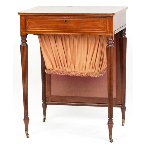 1002 - A good late George III figured mahogany and rosewood crossbanded work table, the lift up back above ... 
