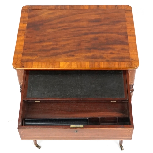 1002 - A good late George III figured mahogany and rosewood crossbanded work table, the lift up back above ... 