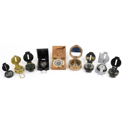 732 - A collection of military interest compasses including J. Wardale & Co. London, the largest 8cm x 8cm... 