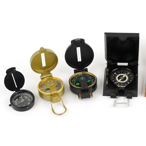 732 - A collection of military interest compasses including J. Wardale & Co. London, the largest 8cm x 8cm... 