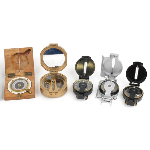 732 - A collection of military interest compasses including J. Wardale & Co. London, the largest 8cm x 8cm... 