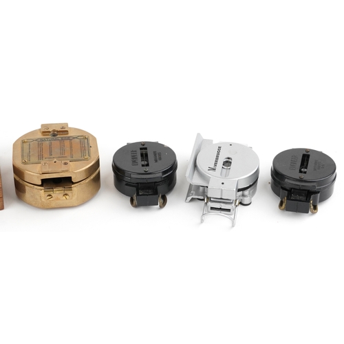 732 - A collection of military interest compasses including J. Wardale & Co. London, the largest 8cm x 8cm... 