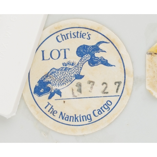 124 - A Chinese blue and white porcelain plate hand painted with pavilions, bearing a Christies' Nanking C... 