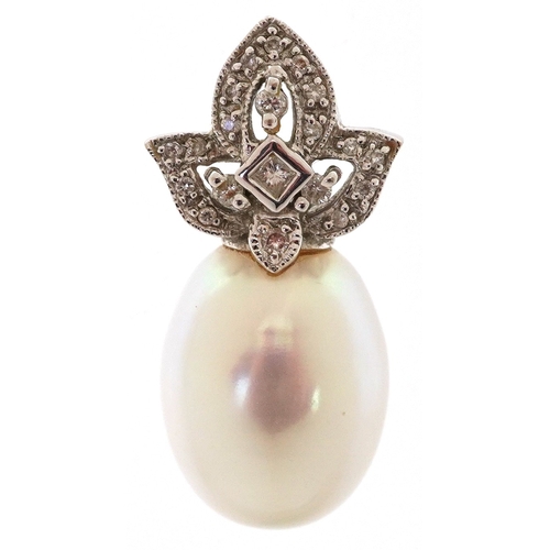 An Art Deco style 18ct white gold diamond and pear shaped pearl pendant, total diamond weight approximately 0.18 carat, 2.6cm high, 4.8g, housed in a Jewellers & Silversmiths Company Guildford jewellery box.