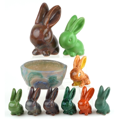 A collection of Bourne Denby Danesby Ware rabbits together with similar ...