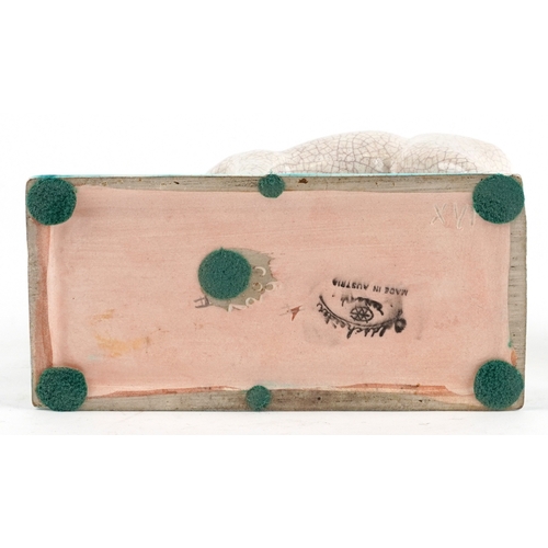 22 - A Goldscheider Art Deco pottery study of a fawn and deer, marks and sticker to the base, 16cm high.