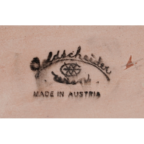 22 - A Goldscheider Art Deco pottery study of a fawn and deer, marks and sticker to the base, 16cm high.