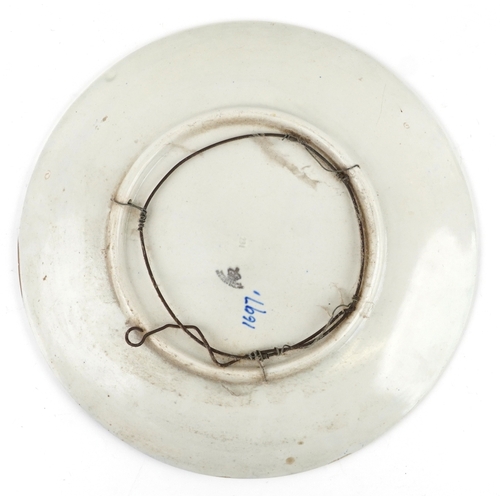 278 - Charlotte Rhead for Wood & Sons, an Art Deco pottery charger hand painted with stylized flowers, num... 