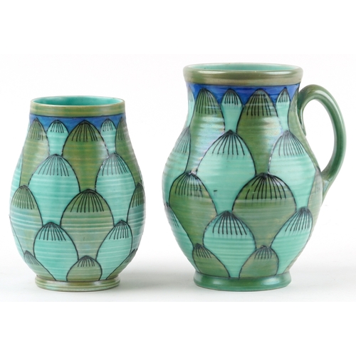 289 - Charlotte Rhead for Crown Ducal, two Art Deco pottery vases hand painted in the Turin pattern, the l... 