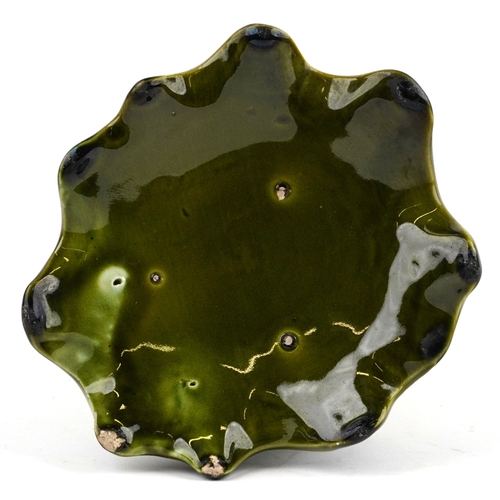 144 - An early 20th century Majolica jug modelled as a frog sitting on a lily pad, probably Bretby, 21cm h... 