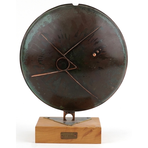 1 - Sam Fanaroff, an Arts & Crafts style copper shield vase having a green stone cabochon, raised on a l... 