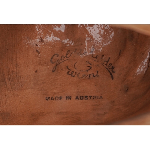 24 - A Goldscheider Art Deco terracotta female wall mask numbered 7608, 30cm high.