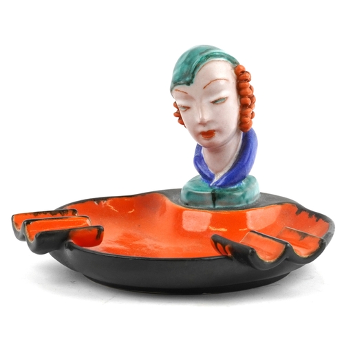29 - A Goldscheider Art Deco pottery ashtray mounted with a female bust, 13cm high.