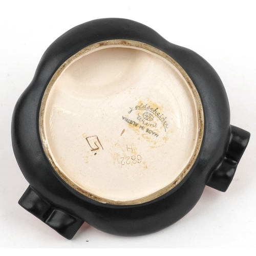 29 - A Goldscheider Art Deco pottery ashtray mounted with a female bust, 13cm high.