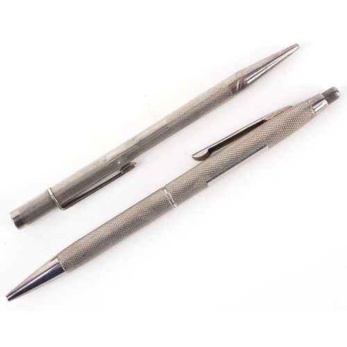 60 - An S J Rose & Son silver ballpoint pen, Birmingham 1965 together with a Cohen & Charles silver prope... 