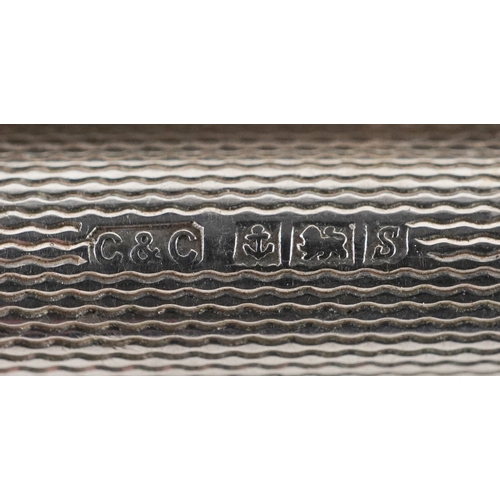 60 - An S J Rose & Son silver ballpoint pen, Birmingham 1965 together with a Cohen & Charles silver prope... 