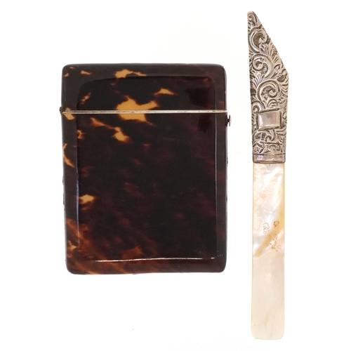 58 - A 19th century tortoiseshell card case with floral silver piqué work together with a silver mounted ... 