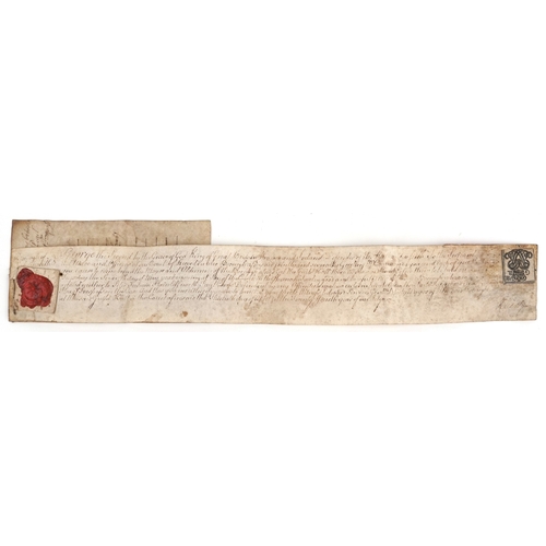 638A - A George II 1751 legal document fragment with wax seal, 36cm wide.